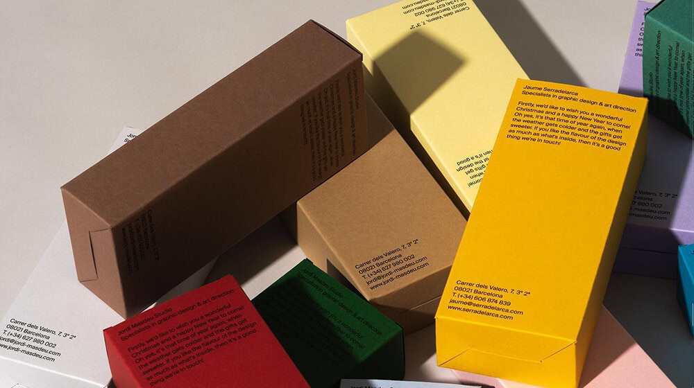 several kraft paper boxes printed with different colors