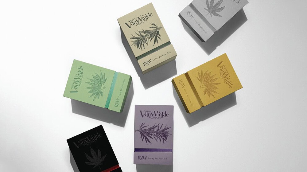 Minimalist cannabis pre-roll packaging boxes with hemp leaf prints