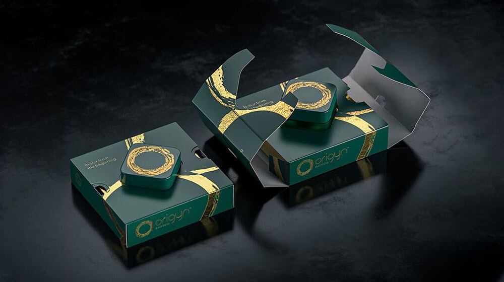 Luxury black and green cannabis concentrate packaging box with gold accents