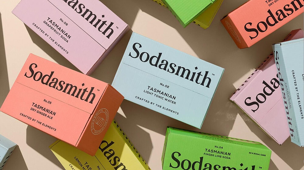 Brightly colored retail packaging boxes for Sodasmith beverages
