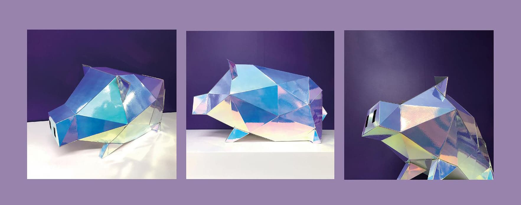 some pig-shaped boxes made by holographic paper