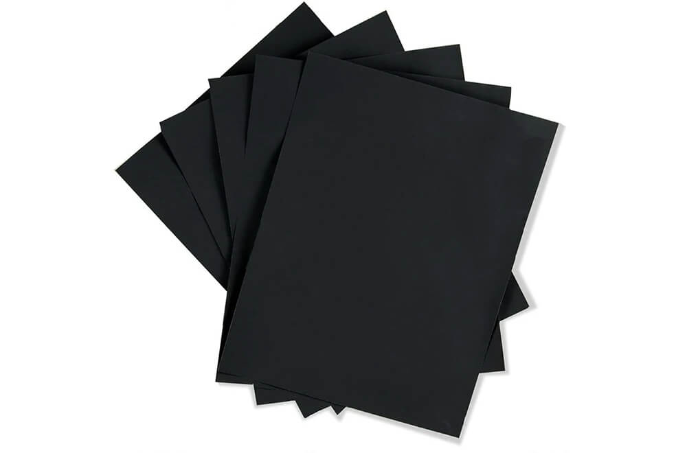five pieces of black kraft paper sheet