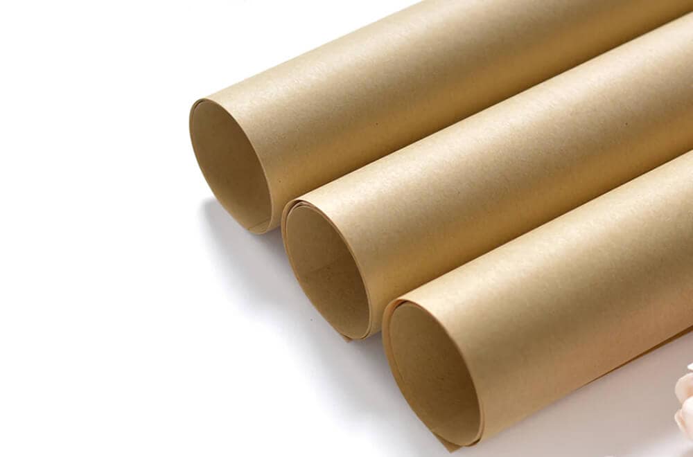 three rolls of natural brown kraft paper