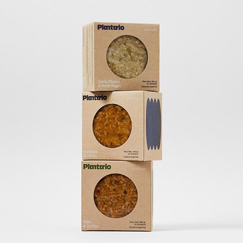 three pieces of brown kraft paper boxes (with die-cut window) stacked up