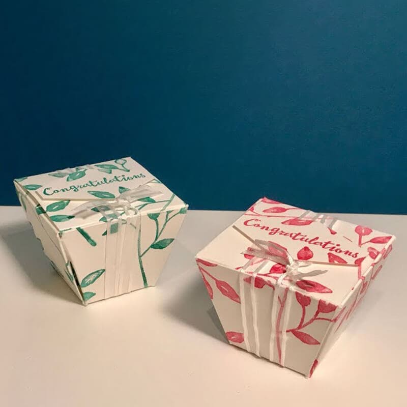 two pieces of trapezoid shaped boxes