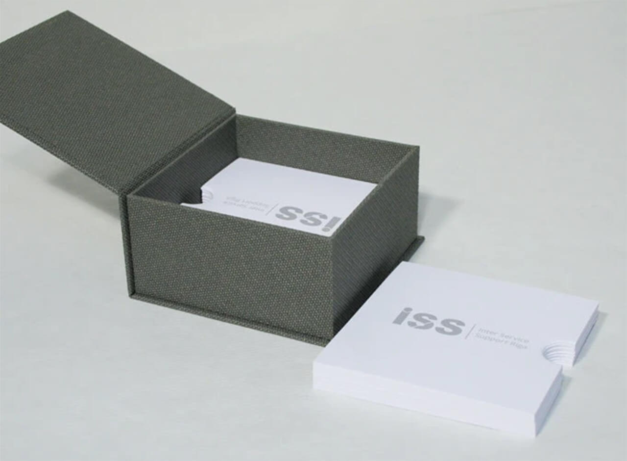 an open magnetic gift box made of luxurious dark grey textured paper