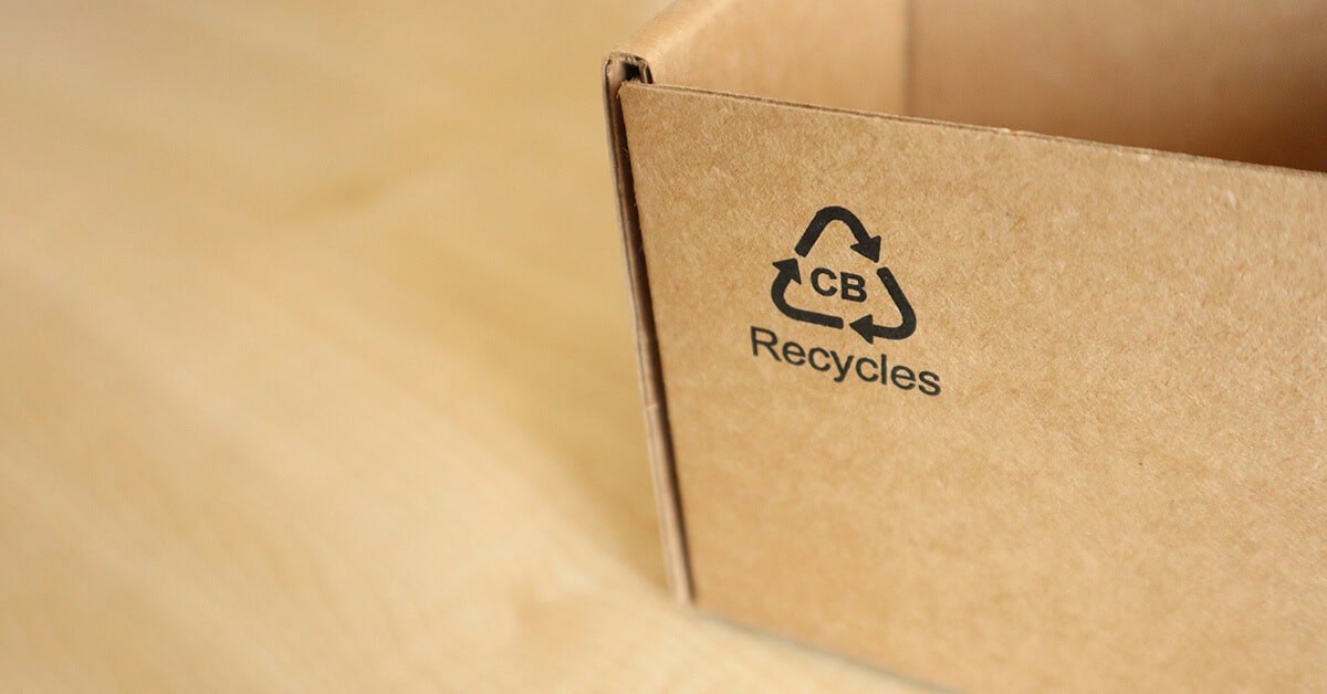 Recycled compostable cannabis packaging with recycling symbol