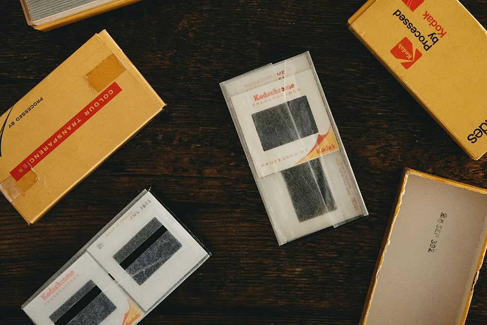 Retro Kodak slide film boxes with protective paper sleeves