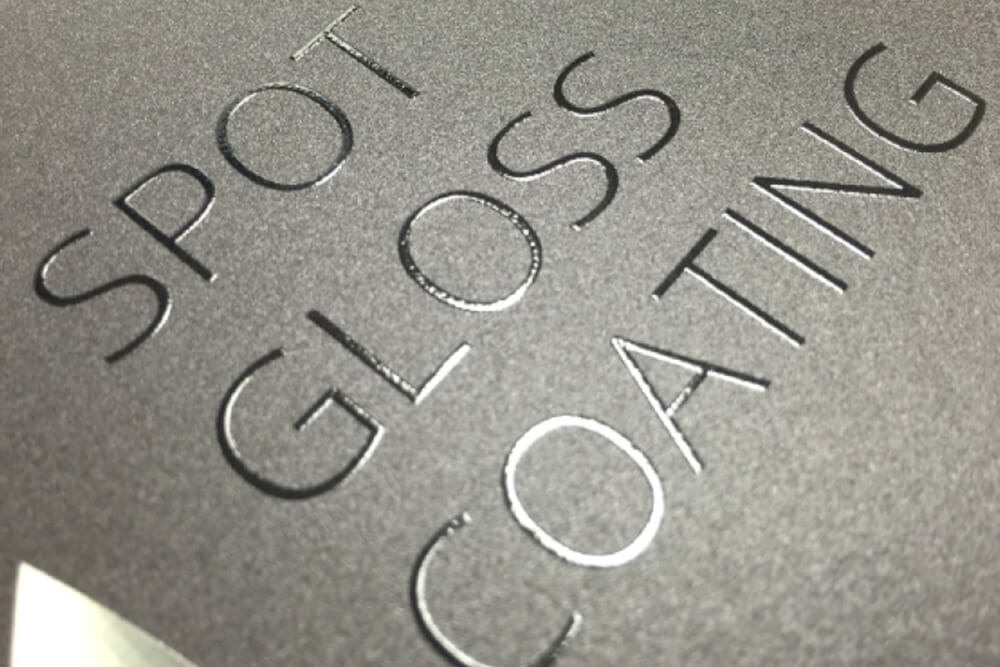 Spot gloss used on a black paper