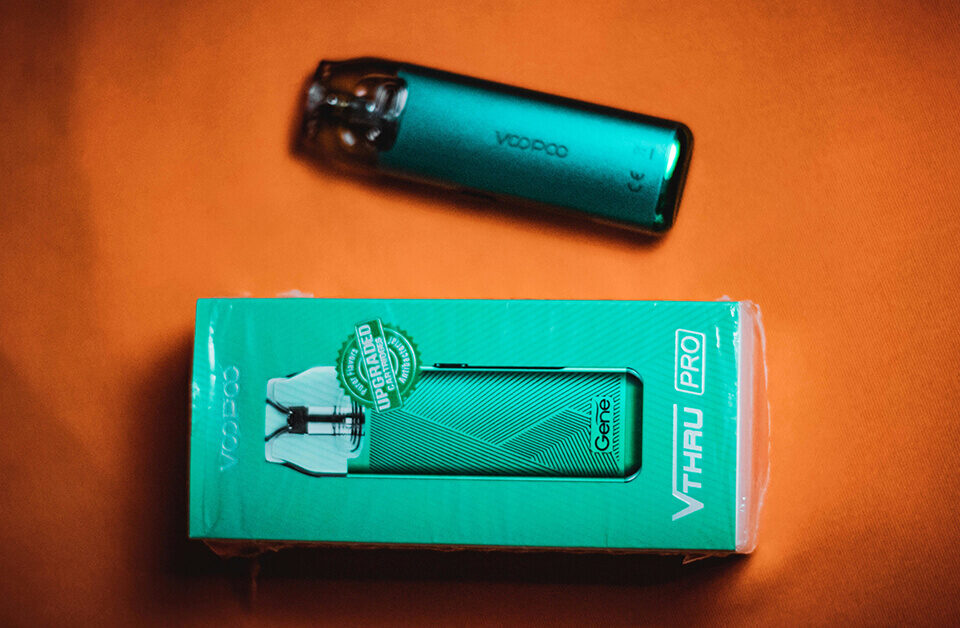 VooPoo VTHAU Pro cannabis vape packaging device with its vibrant green packaging design for premium vape packaging.