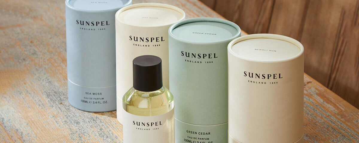 cardboard cylinder packaging tubes with perfume bottle on the side