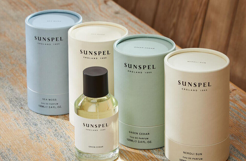 cardboard cylinder packaging tubes with perfume bottle on the side