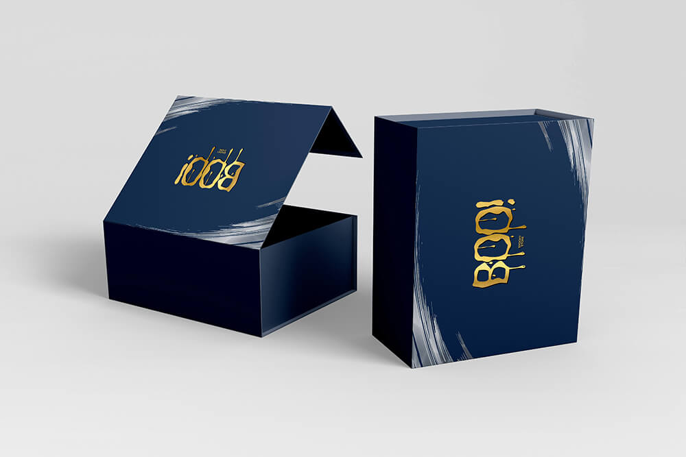 Custom paper box with a bold "BOO!" design in navy blue and gold.