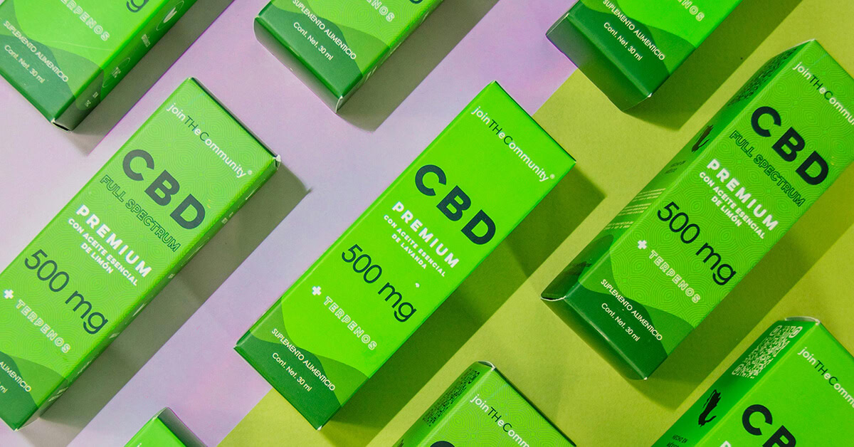 Custom CBD packaging in vibrant green custom tuck top boxes showcasing premium full-spectrum CBD products.