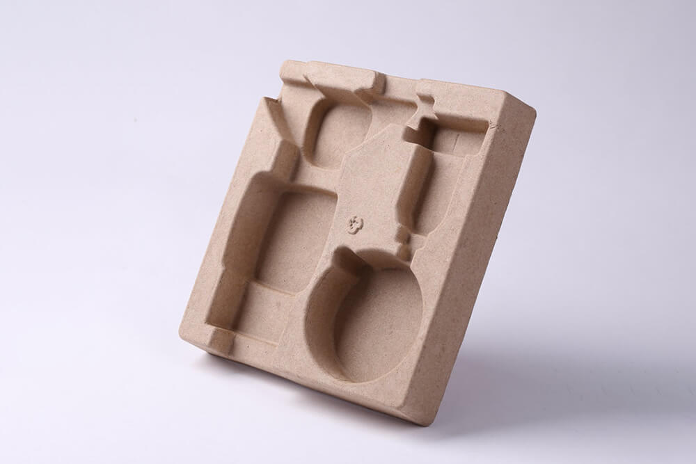 Molded pulp inserts for boxes