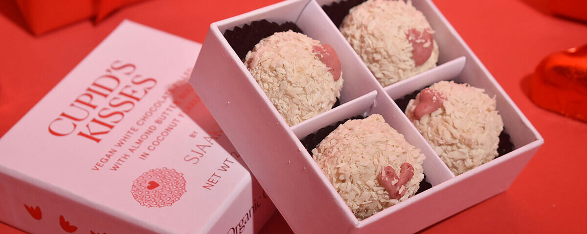 Custom truffle box packaging with divided compartments holding premium chocolate truffles