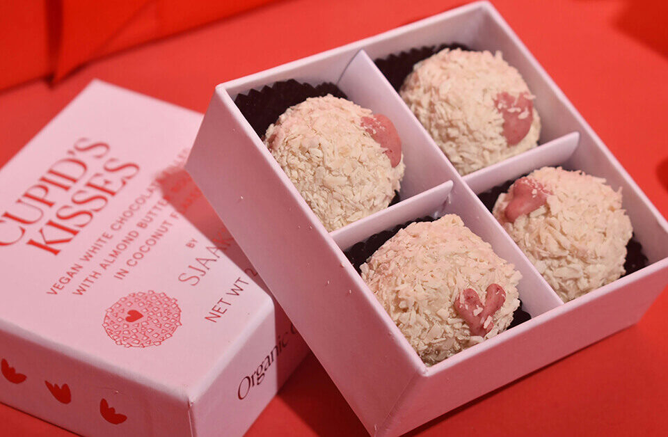 Custom truffle box packaging with divided compartments holding premium chocolate truffles