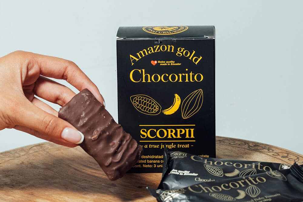 Chocolate bar packaging design with bold graphics and product interaction.