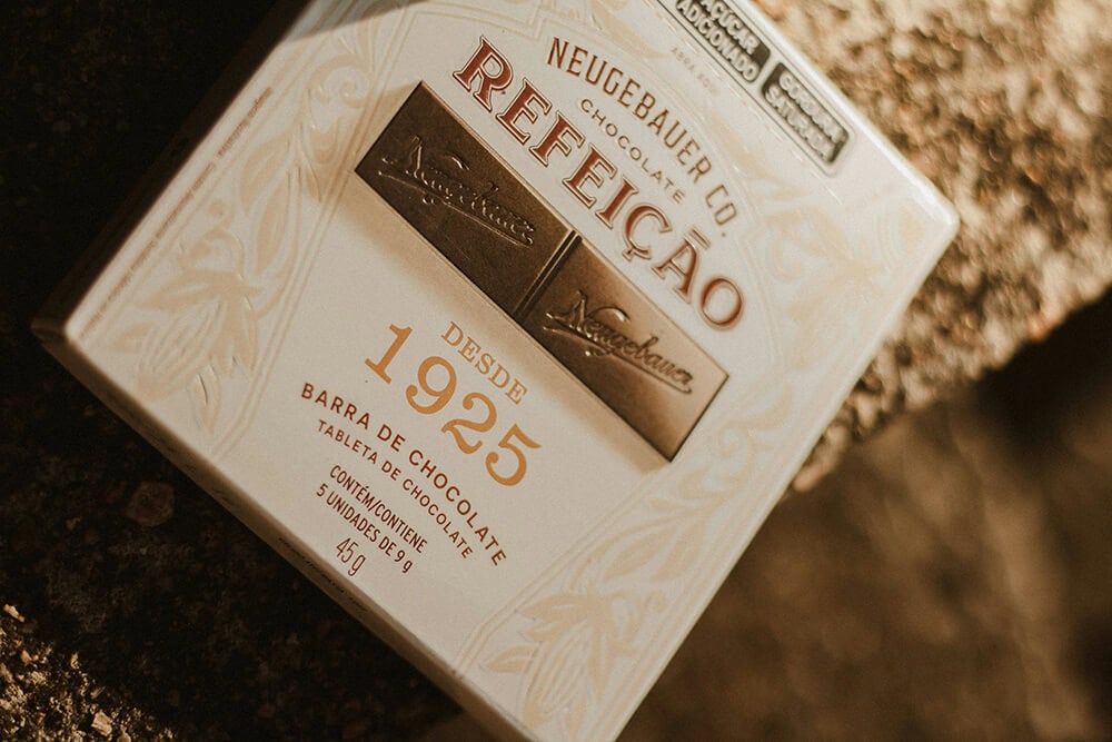 Vintage-style chocolate bar packaging with classic typography and paperboard design.