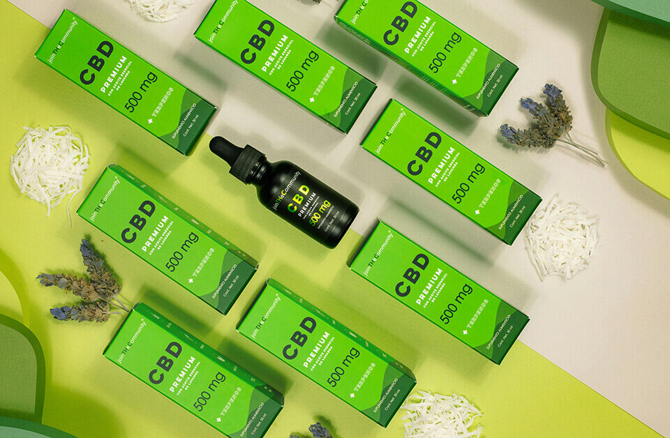 Environmentally friendly packaging for CBD products using green paper boxes and recyclable materials.