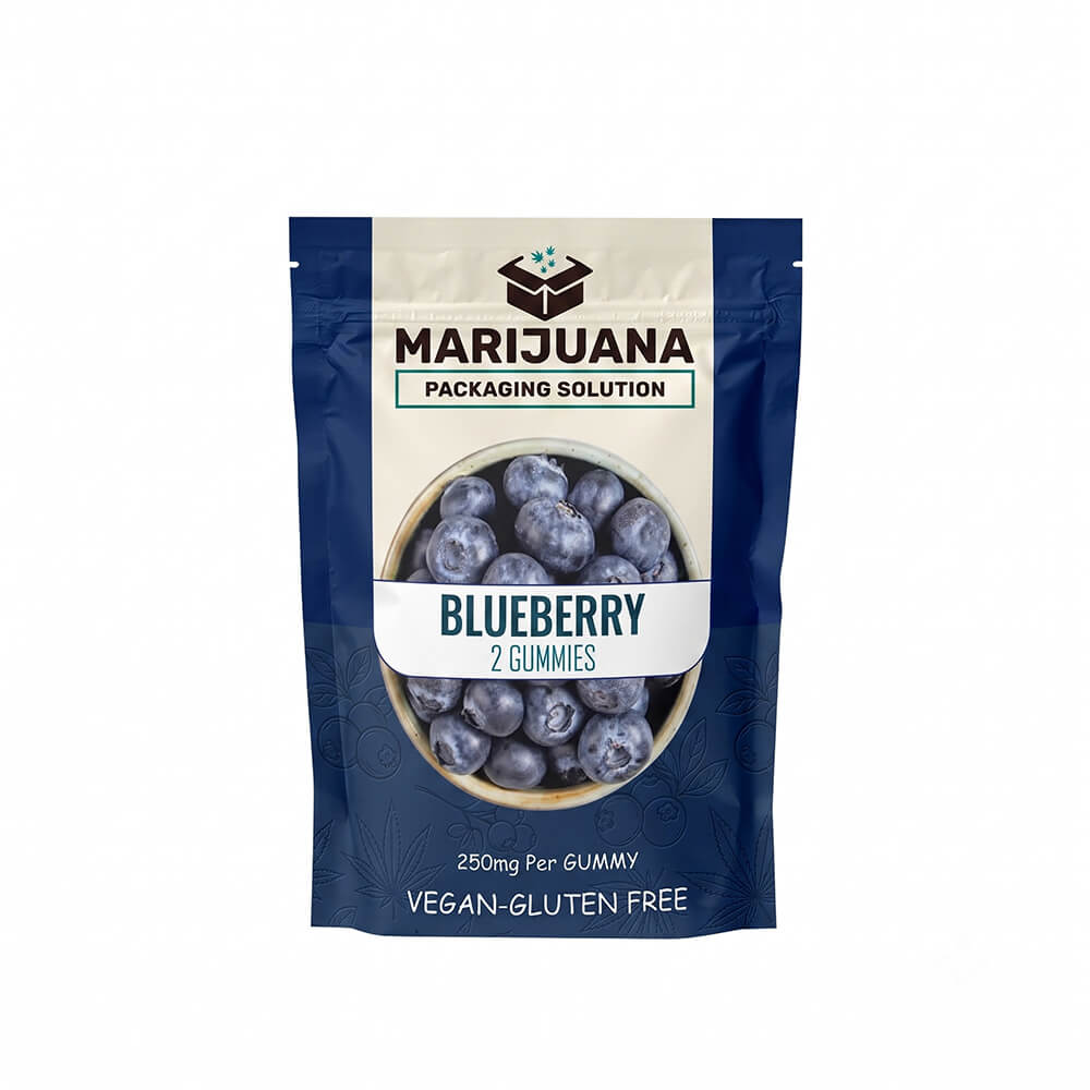 Dark blue and cream THC candy packaging bag with a window displaying fresh blueberries, labeled as vegan and gluten-free.