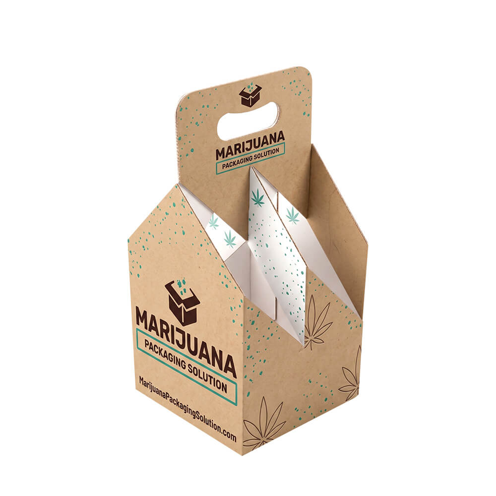 An empty 3-compartment kraft paper carrier box from an angle, showing the die-cut handle and white internal dividers. It is printed with Marijuana Packaging Solution branding and green cannabis leaves.