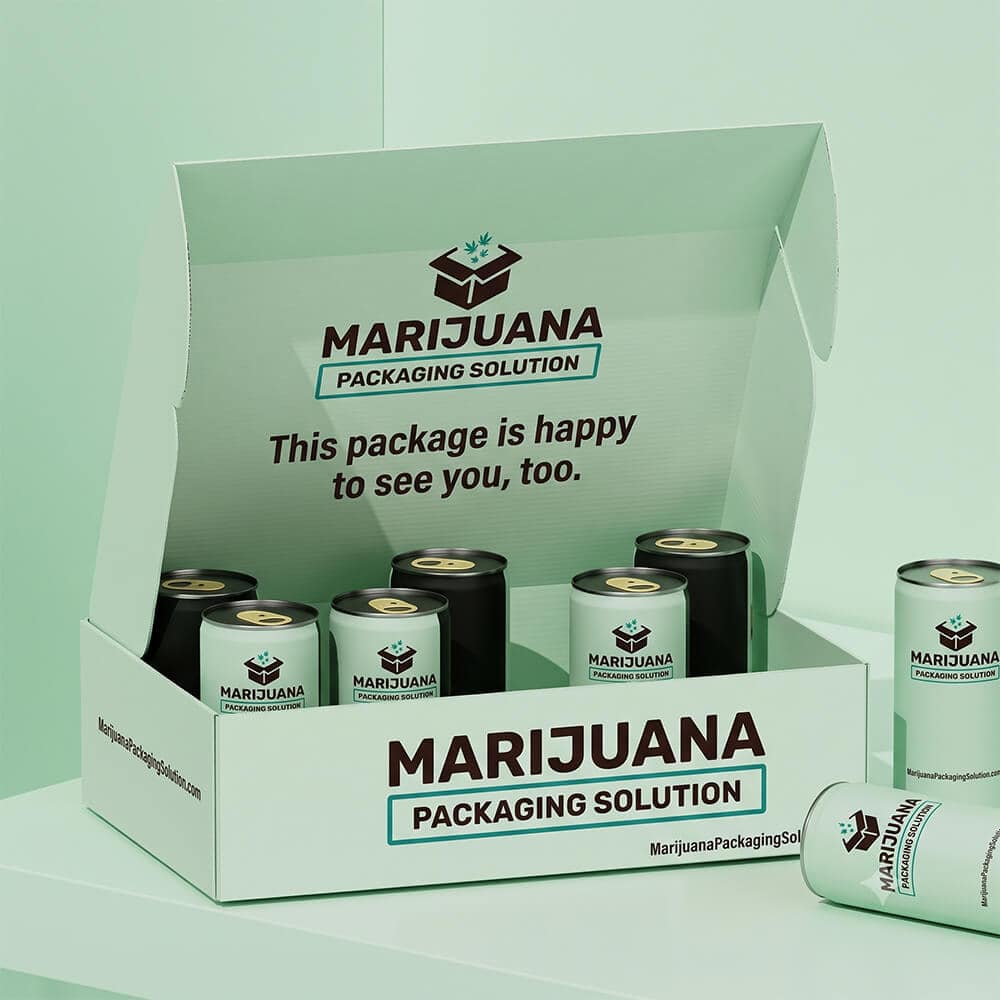 An open white gift or mailer box with a fold-over top. The inner lining is teal, holding six can mockups with Marijuana Packaging Solution logos and "MPS" text. The lid has a friendly message. A loose can lies to the right.